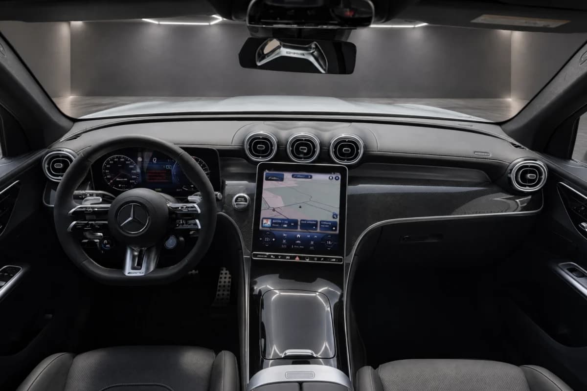 GLC 63 dashboard: the parking lot seen through the windscreen becomes the studio